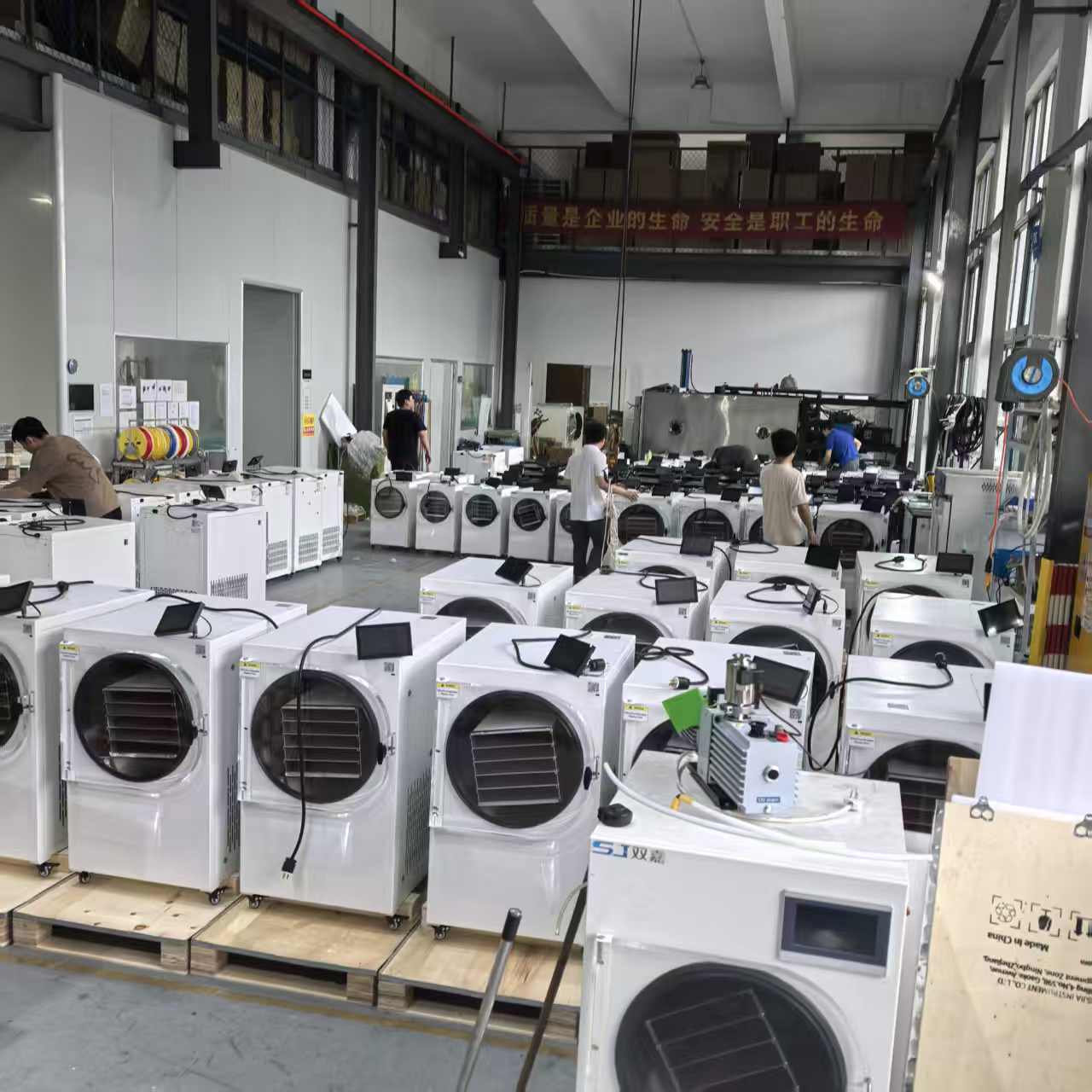 Compact food freeze dryer pre-delivery preparation compact home food freeze dryers undergoing factory preparation before delivery to Europe and the United States